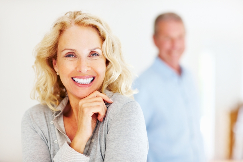 Couple with dental implants in Fort Lauderdale